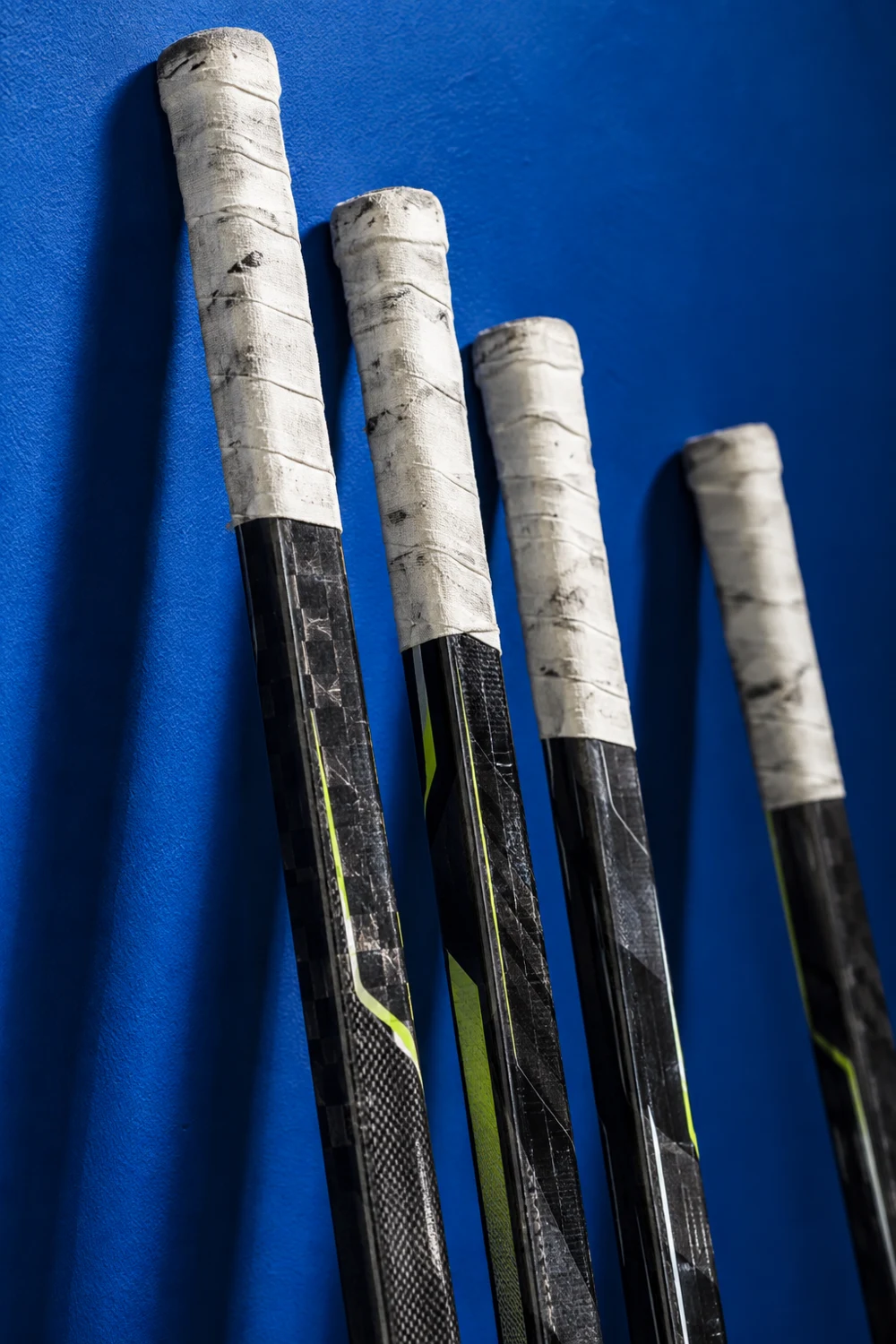 Illustrative hockey sticks and taped grips